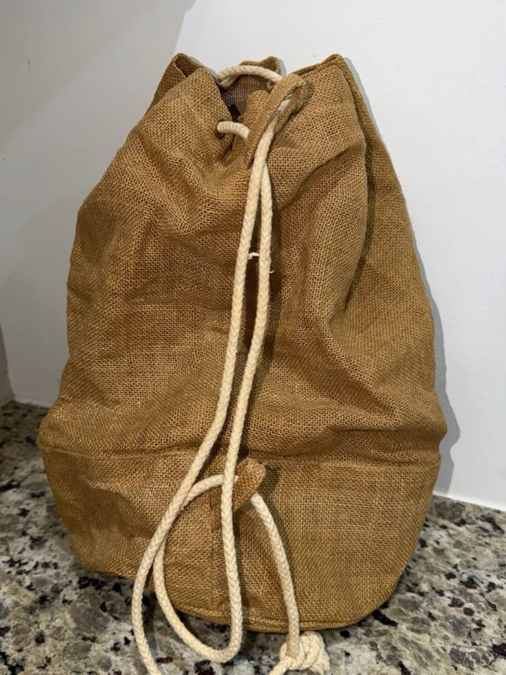 Tan Jute Drawstring Duffel Bag with Red Accent